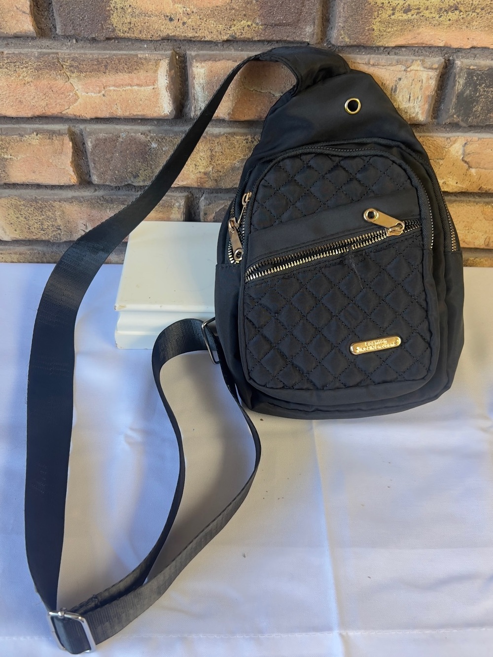 Black Quilted Sling Belt Bag with Gold Accents